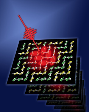 Grafik: Extrem kurze Laserpulse (rot) schalten in Manganit-Kristallen sehr schnell zwischen zwei magnetischen Zuständen