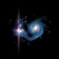 Hochaufgelöste Simulation einer frühen Galaxie und ihrer Umgebung. Links im Bild blitzt eine extrem leuchtstarke Supernova auf.