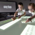 Mathematik-Unterricht an interaktiven Tischen fördern das Denken und Begreifen, auch bei den Achtjährigen Jamie Young und Jade Loveland von der High Spen Primary School in Gateshead.