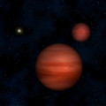 So könnten die beiden Braunen Zwerge aussehen. Es handelt sich bei ihnen um Riesenplaneten, die zu klein sind, um ein Sonnenfeuer zu zünden.