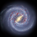 Die Milchstraße besitzt nach der neuen Studie insgesamt vier Arme. Die Lage der Erde ist mit einem schwarzen Kreis markiert, die roten Punkte zeigen die neu entdeckten schweren Sterne.